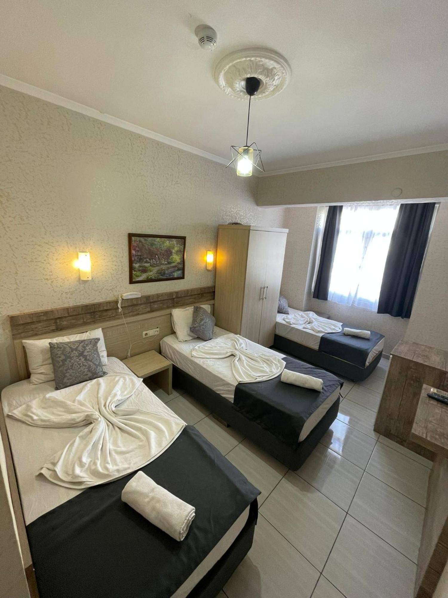 Denizhan Hotel Antalia Esterno foto