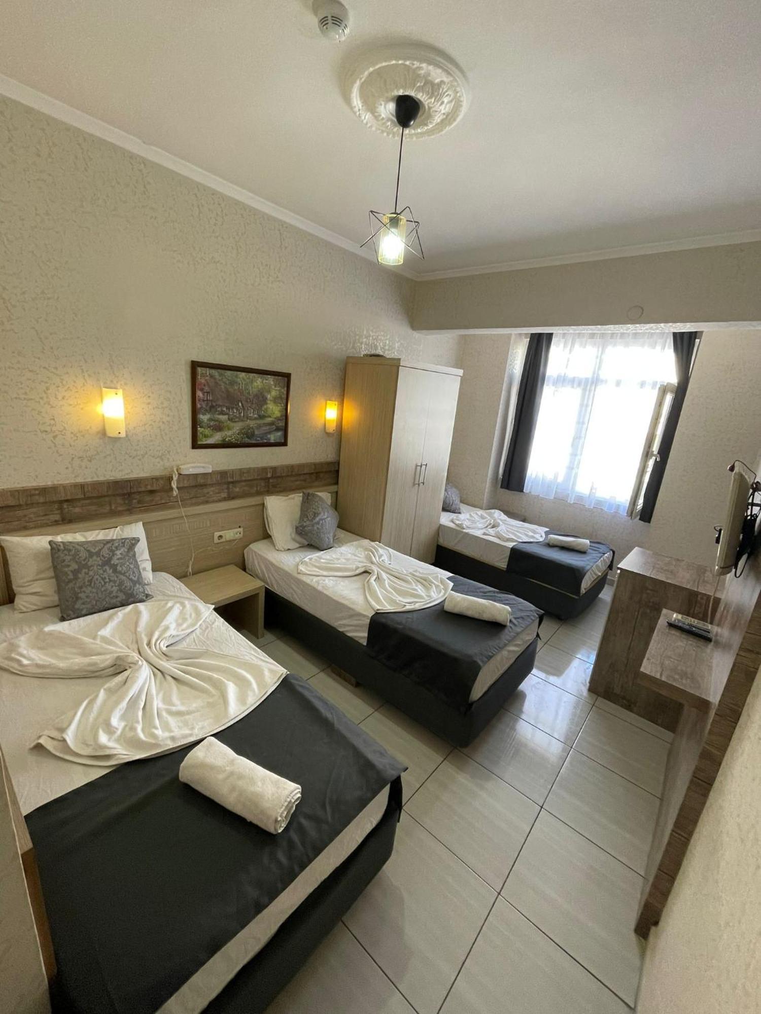 Denizhan Hotel Antalia Esterno foto