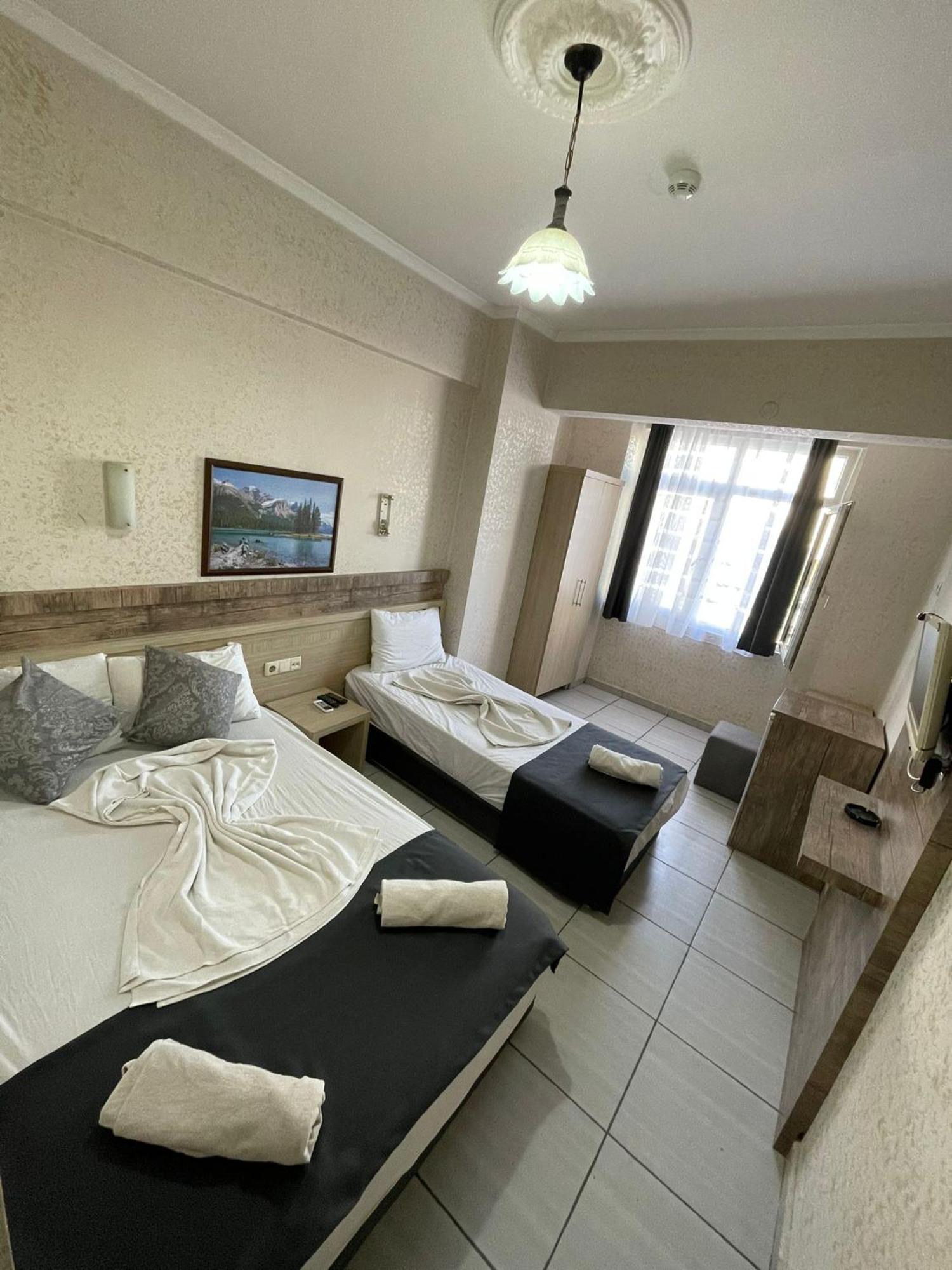Denizhan Hotel Antalia Esterno foto