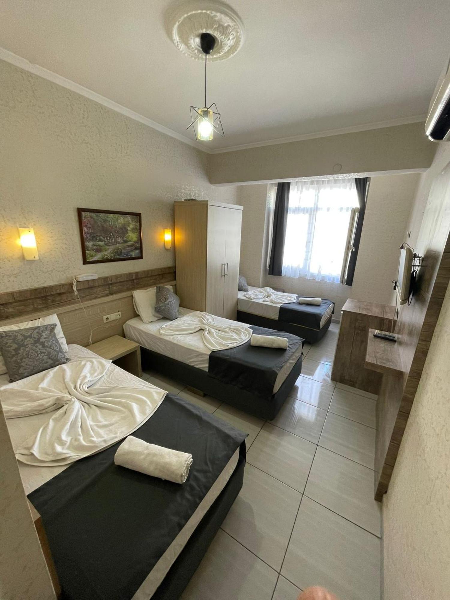 Denizhan Hotel Antalia Esterno foto