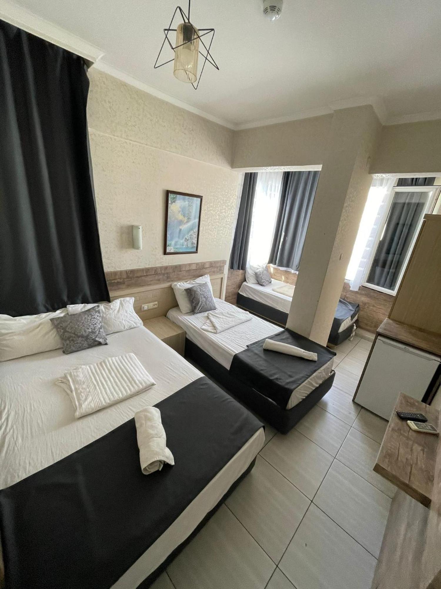 Denizhan Hotel Antalia Esterno foto