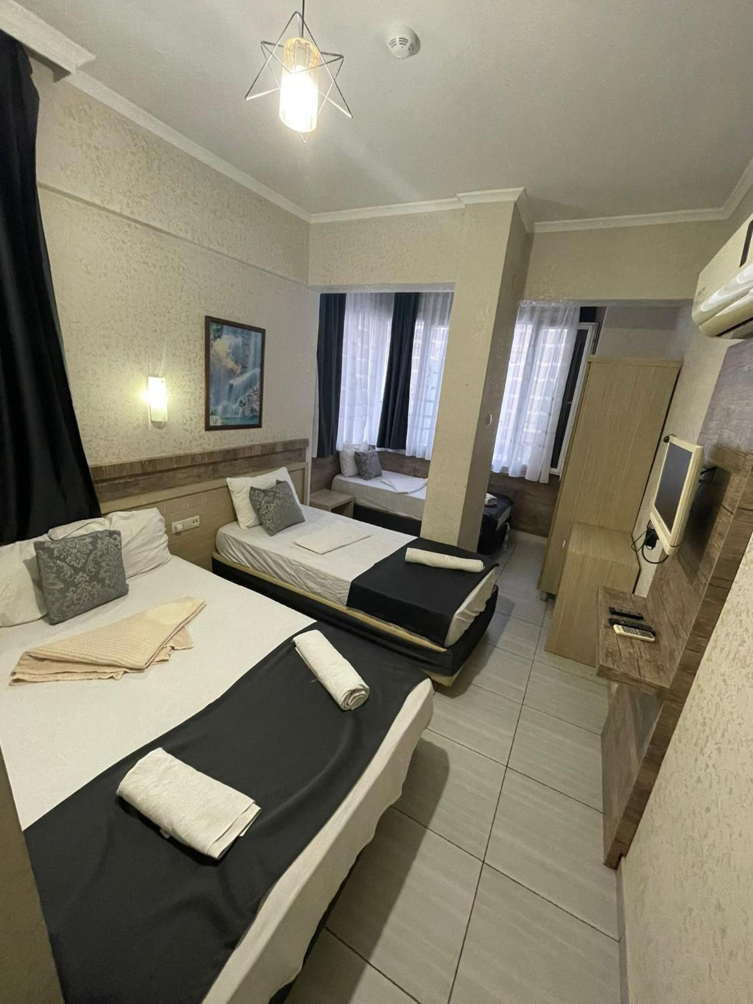 Denizhan Hotel Antalia Esterno foto